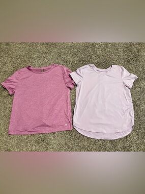 2 girls athletic shirts. Sz L 10/12